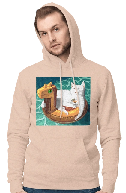 Білий кіт у плавальному колі, на відпочинку