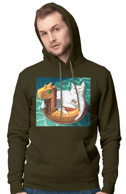 Білий кіт у плавальному колі, на відпочинку