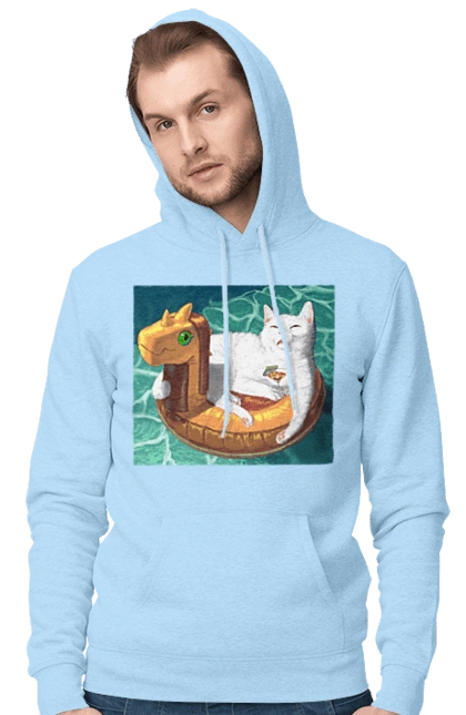 Білий кіт у плавальному колі, на відпочинку