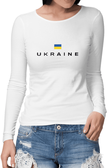 Жіночий лонгслів з принтом "Ukraine прапор України". Ukraine lives matter, антипутинська футболка, емблема всу, зелена футболка, класичний герб україни, націоналістичні футболки, патріотичні футболки, українська футболка, футболка без війни, футболка вільна україна, футболка все, футболка героям слава, футболка для патріотів, футболка зеленого, футболка любите україну, футболка привид києва, футболка російський корабель, футболка світ україни, футболка слава україні, футболка справжній українець, футболка стоп війна, футболка я українець, футболки з боєприпасами, футболки з тризубцем. CustomPrint.market