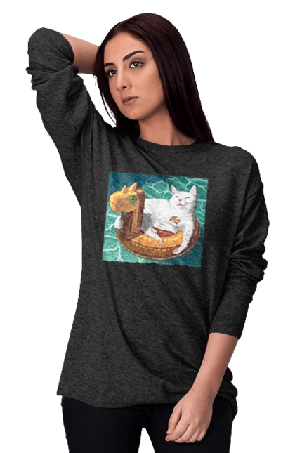 White cat in a swimming circle on vacation