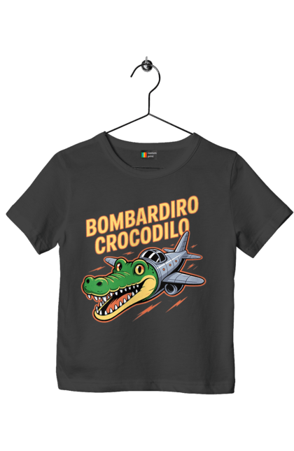 Футболка дитяча з принтом "Bombardino Crocodilo". Bombardino, bombardino crocodilo, crocodilo, бомбардиро крокодило, бомбардіно крокоділо, крокодил, крокодил літак, крокодил мем, мем бомбардине крокодило, меми. 2070702