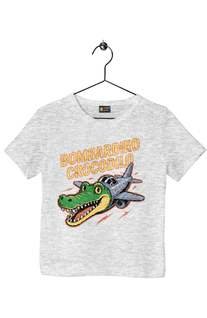 Футболка дитяча з принтом "Bombardino Crocodilo". Bombardino, bombardino crocodilo, crocodilo, бомбардиро крокодило, бомбардіно крокоділо, крокодил, крокодил літак, крокодил мем, мем бомбардине крокодило, меми. 2070702