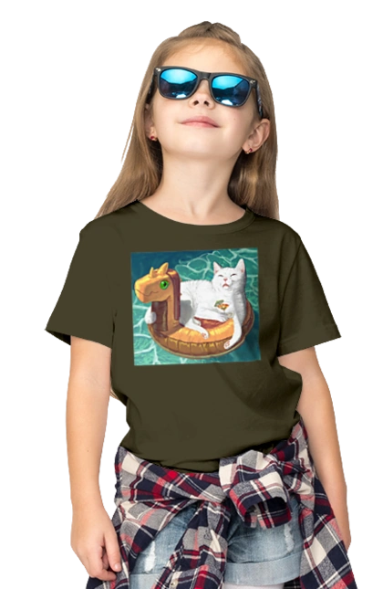 White cat in a swimming circle on vacation